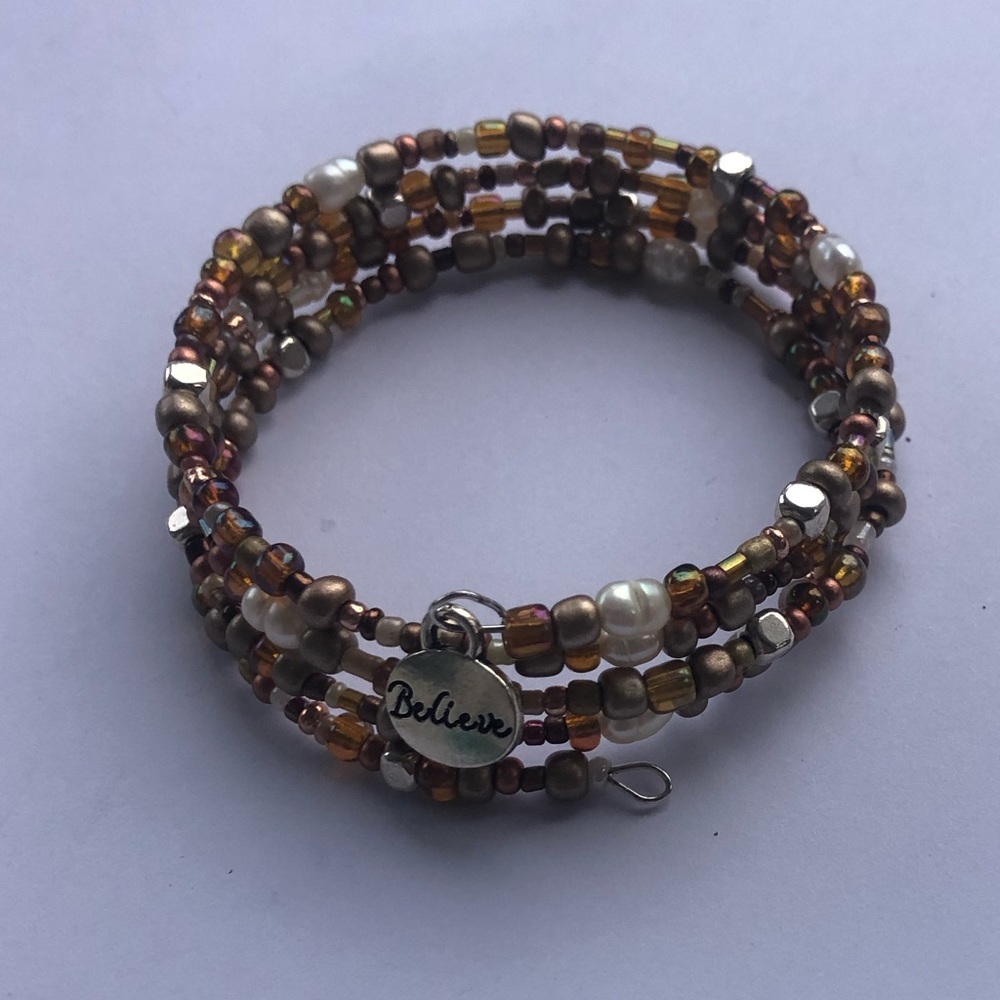 Handcrafted wire wrap bracelet (with “Believe” charm)